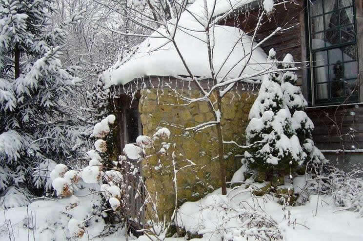 The Olde Orchard Cottage Laden with Snow