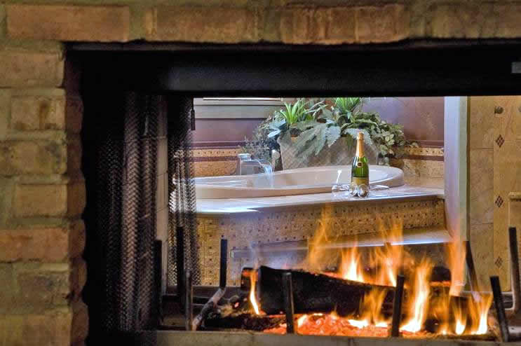 View of the Fireplace From the Spa Tub